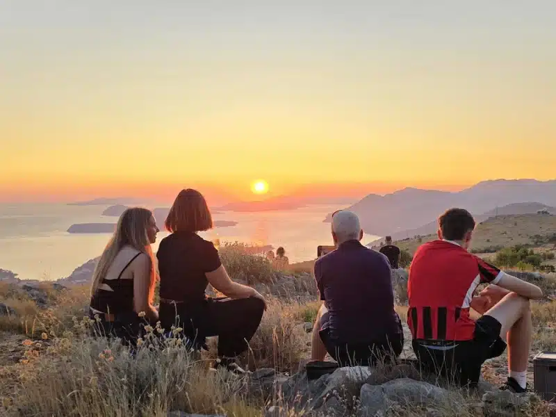 Family Enjoying the Sunset View from Srđ Mountain Over the Elaphiti Islands