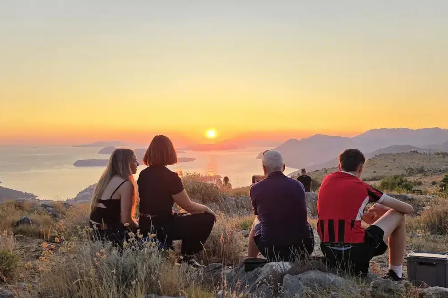 Family Enjoying the Sunset View from Srđ Mountain Over the Elaphiti Islands