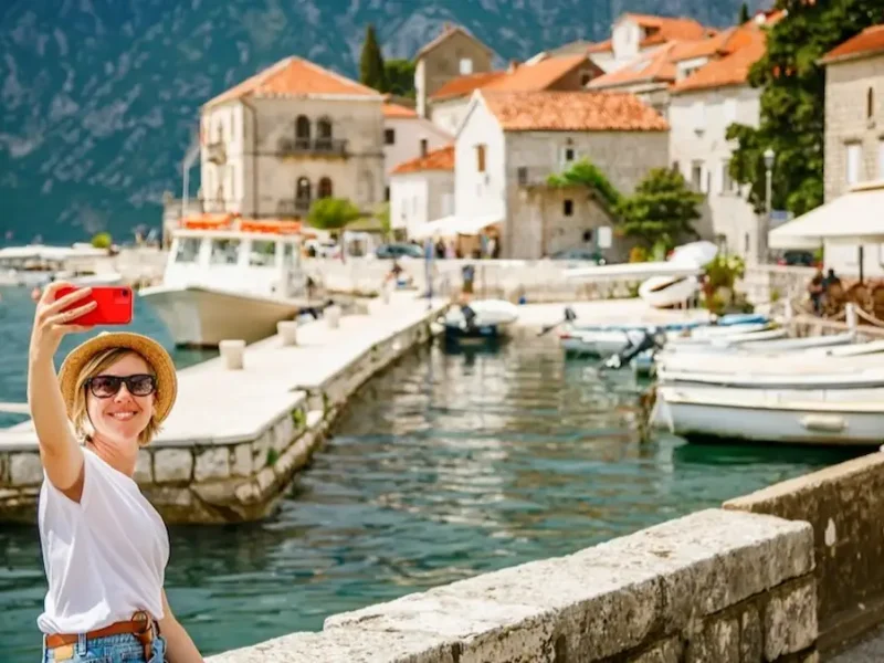 Perast, Montenegro – Woman Taking a Selfie on the Bay of Kotor Waterfront